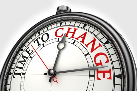 A clock shows “TIME TO CHANGE” in black and red text.