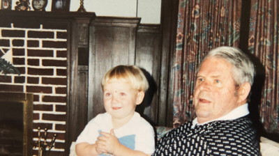 Brookes Townsend on Warren Townsend's lap Photo