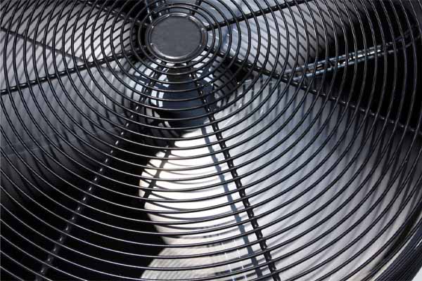 image of an air conditioner fan in the outdoor unit