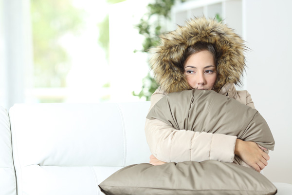 image of woman with broken heating system