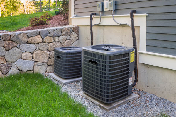 image of an air conditioner and a heat pump