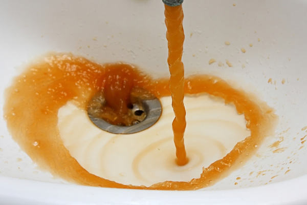 rust colored water coming out of faucet