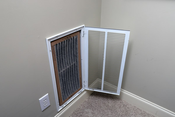 removing dirty HVAC filter for home central air conditioning system