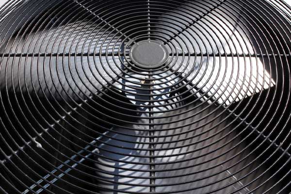 image of an air conditioner fan in the outdoor unit