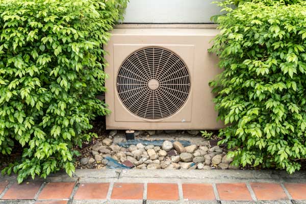 image of an outdoor condenser for an air conditioning unit