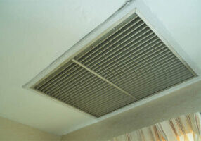large square return hvac air vent located in the ceiling of a home